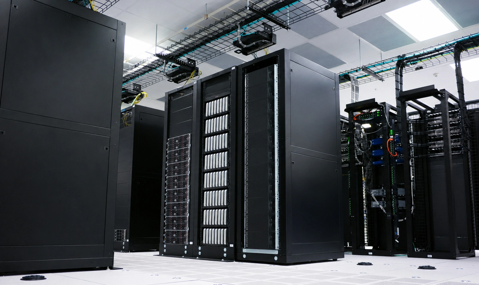 Rows of server and storage hardware in a data center.